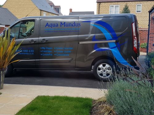 Aqua Mundus Servicing and Breakdown van parked outside